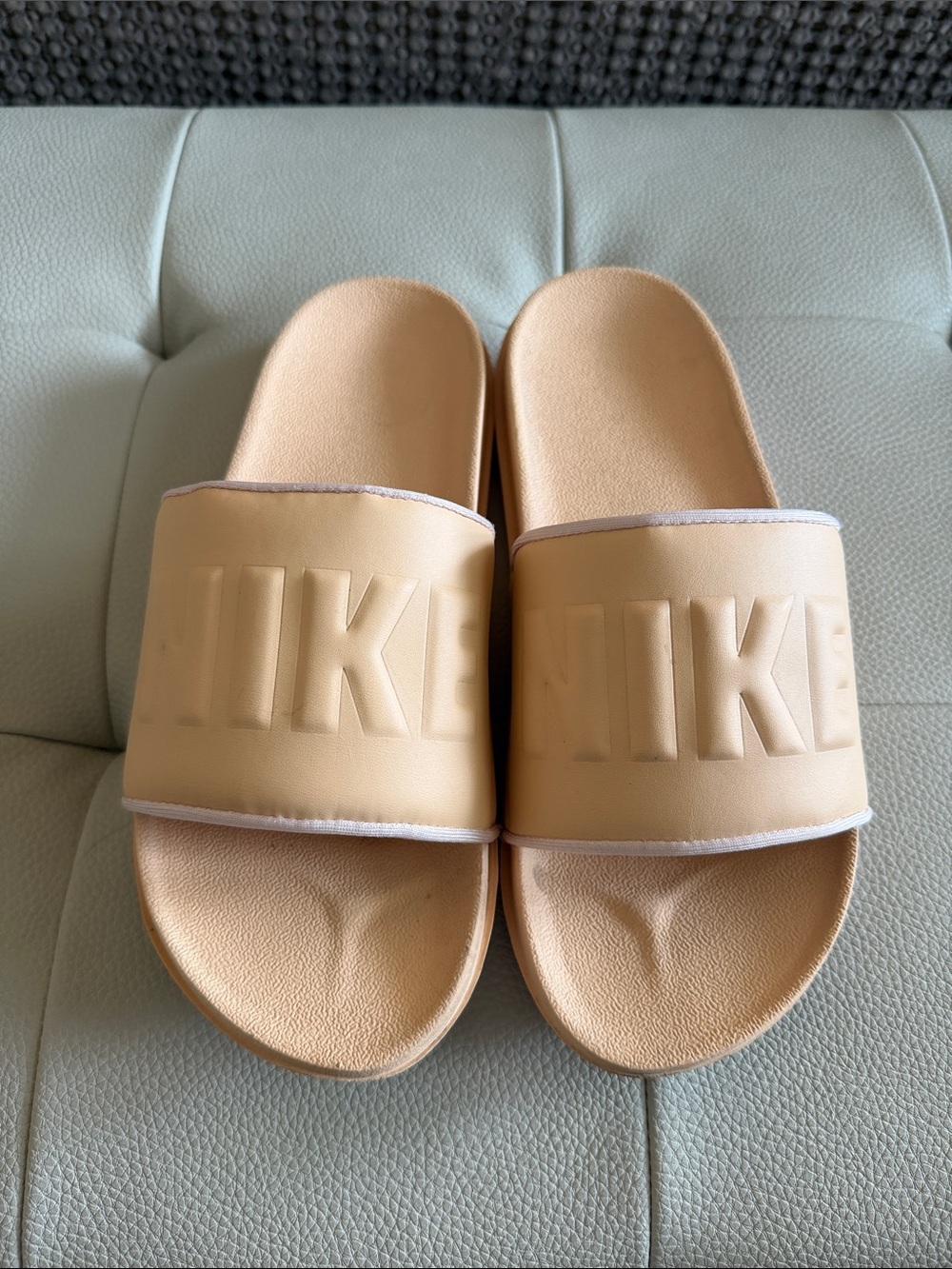 Women’s Nike Revive Foam Peach/pink Slide Sandals with Embossed Logo